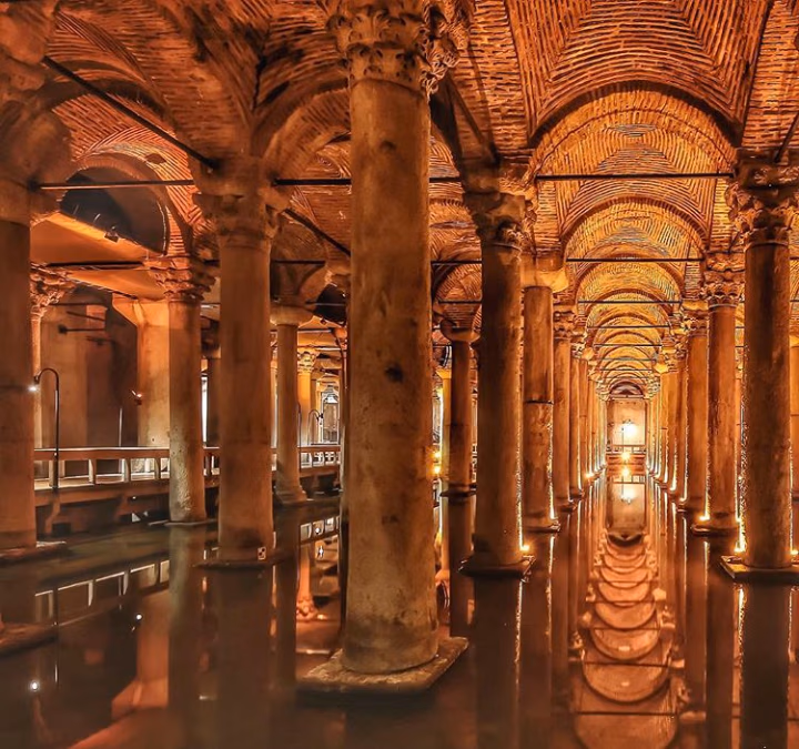 Reflections of Basilica Cistern columns on water and brick vaulted ceiling.