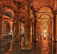 Reflections of Basilica Cistern columns on water and brick vaulted ceiling.