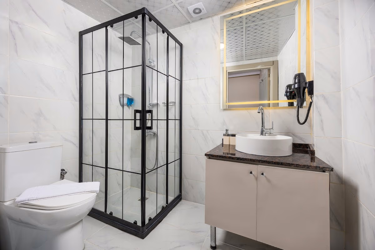 Taksim Peradise Otel'de dinlenmeye hazırlanmış konuk odası - Elemen Transfer
