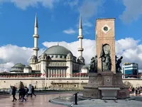 Taksim Mosque and Republic Monument with people walking, Elemen Transfer VIP transfer.
